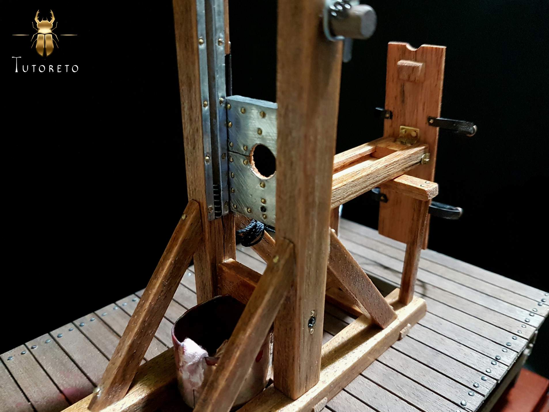 miniature guillotine execution scene